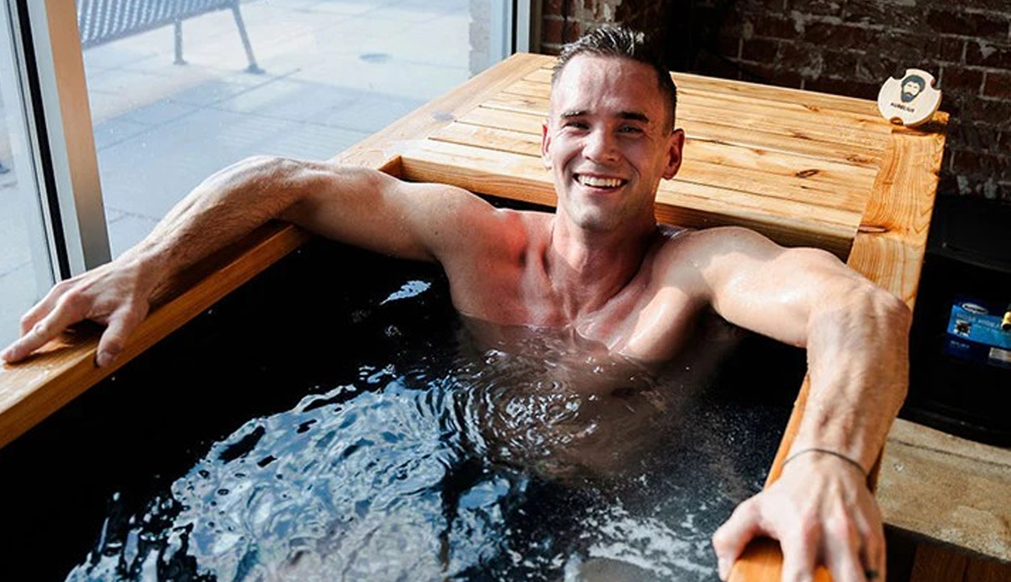 Man enjoying cold plunge therapy at Right Balance Pilates in Lewes, Delaware